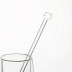 Glass straw in cup