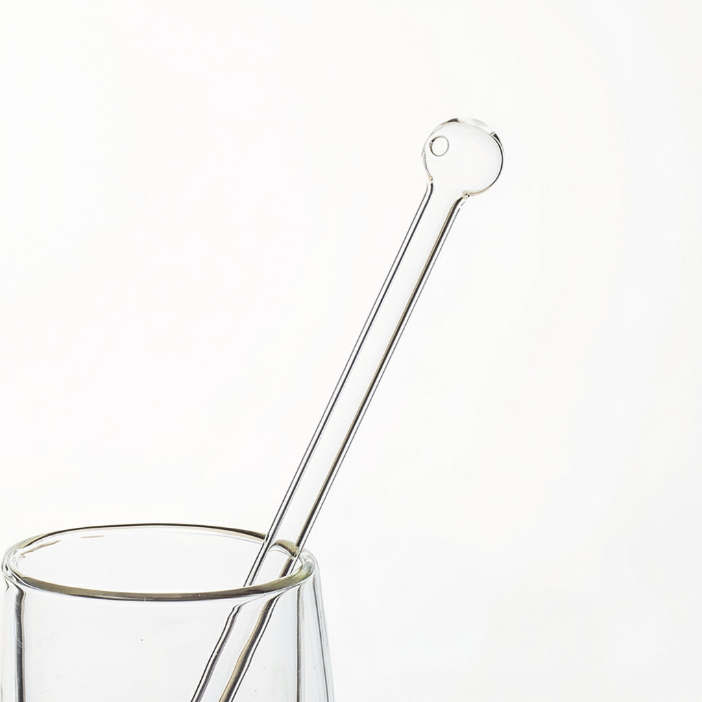 Glass straw in cup